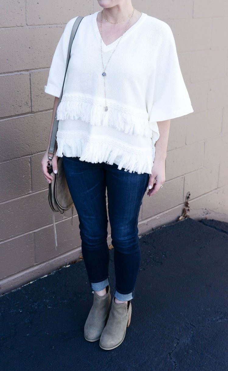 love this dressy poncho paired with dark skinny jeans and tan suede booties 